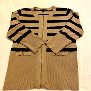 Nice sweater with zipper beige, size  Medium.